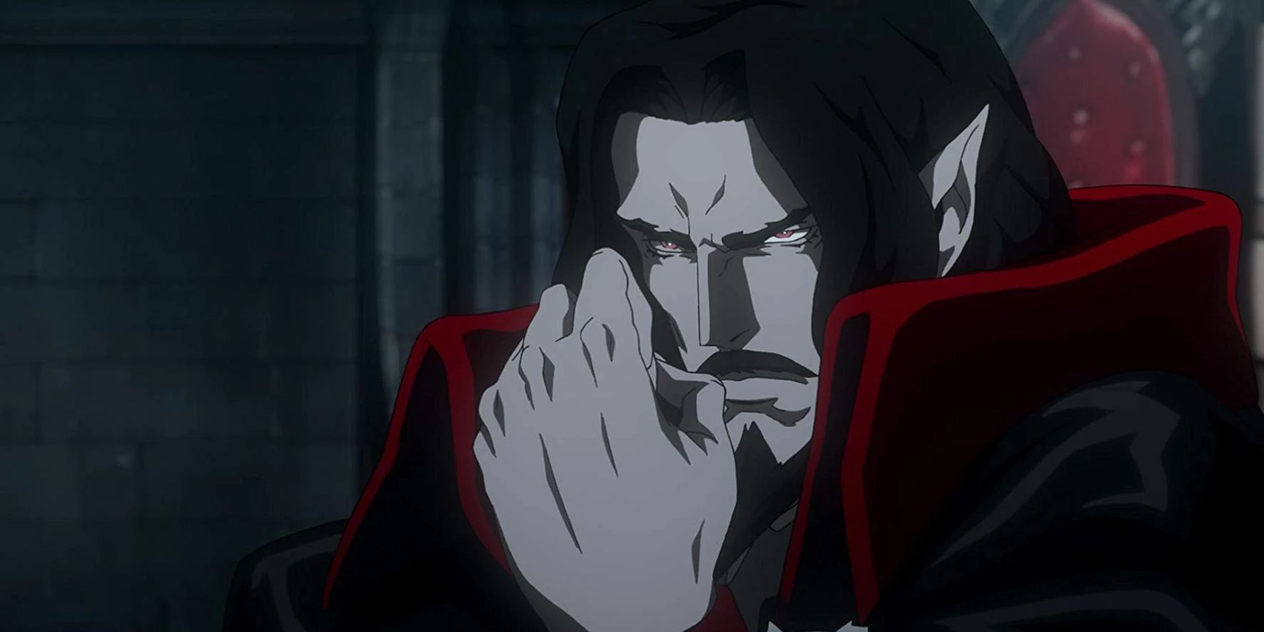 A chin up close up of Dracula, voiced by Graham McTavish, staring angrily ahead with his fist clenched in front of his face in Castlevania