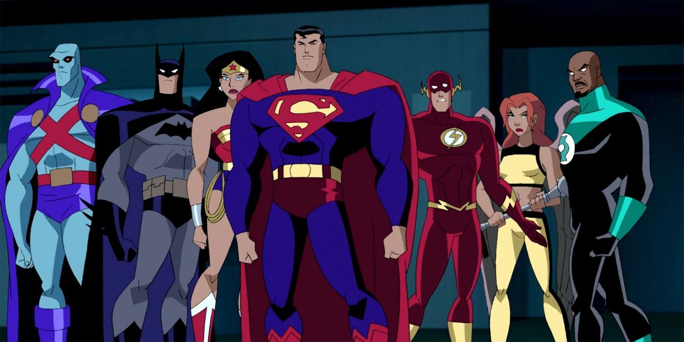 The cast of Justice League Unlimited stand with Superman in the middle.